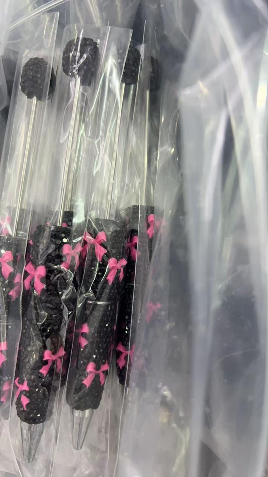 bow pen black rhinestone with hot pink bow pen