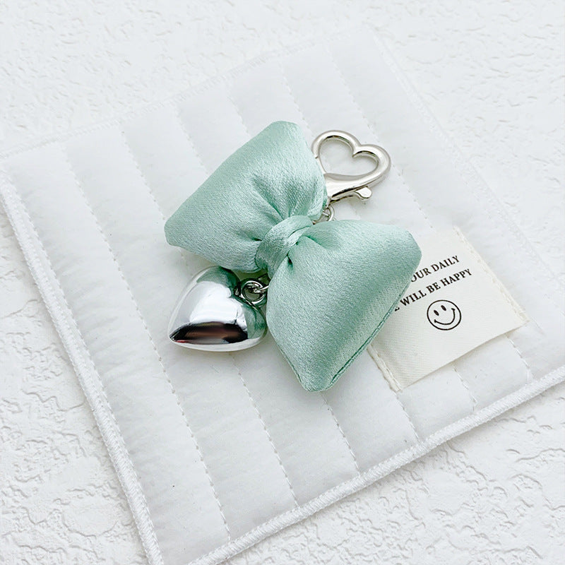 Three-dimensional bow Silver metal heart-shaped keychain Bag pendant Random Mix