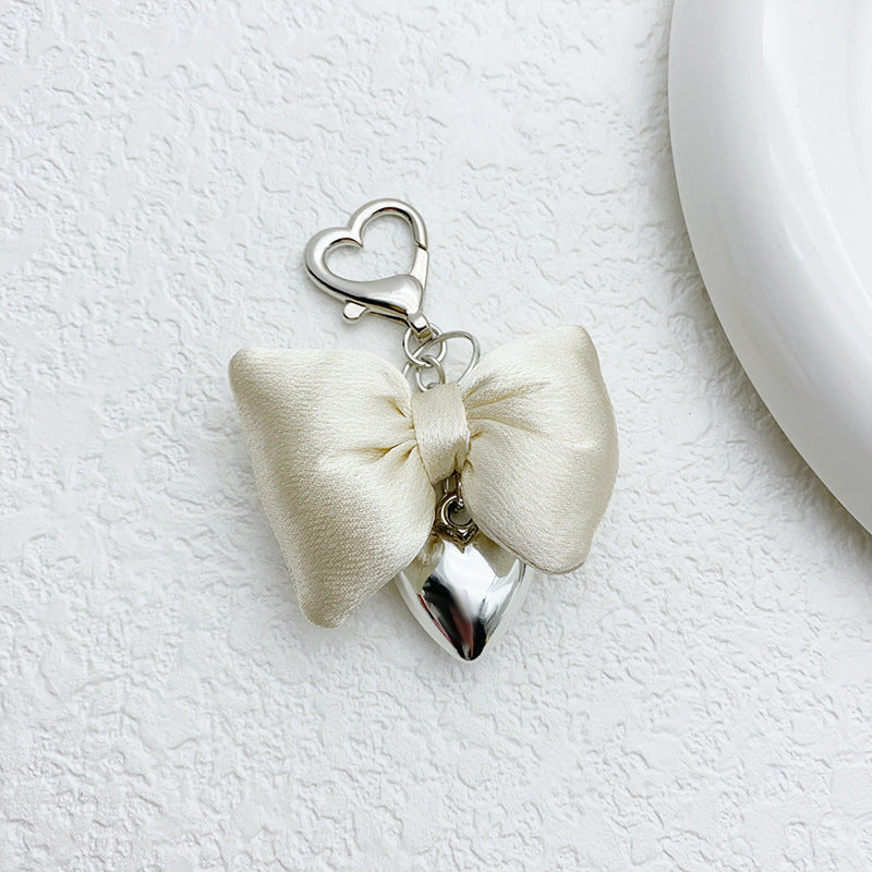 Three-dimensional bow Silver metal heart-shaped keychain Bag pendant Random Mix