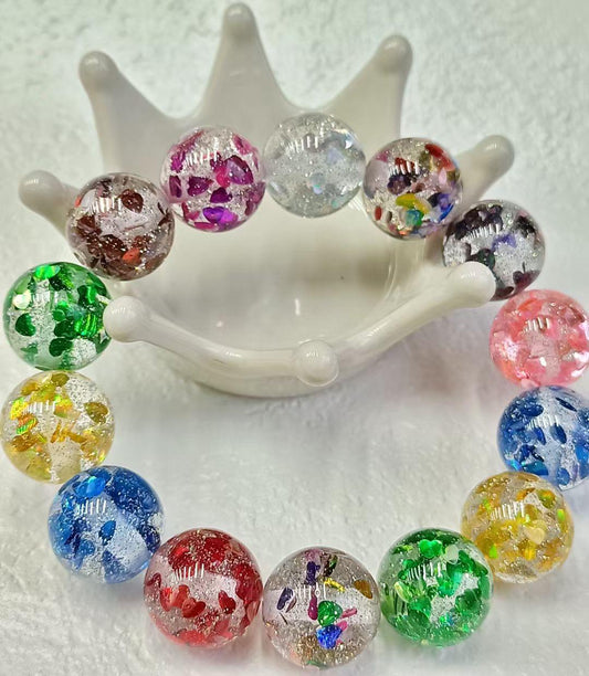 acrylic bead acrylic with confetti heart inside colored ,random mix 16mm