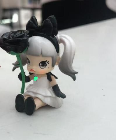 popma figure character molly pind and white pen topper