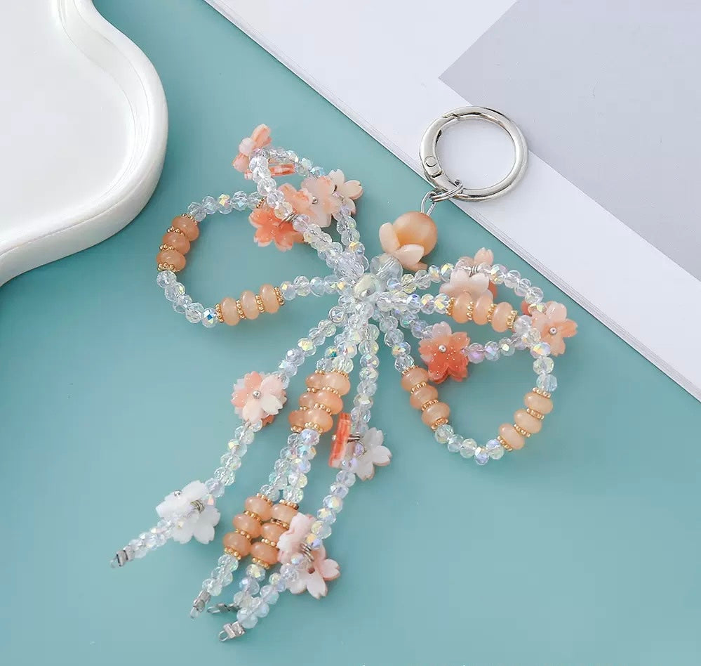 Phone chain bow with flower keychain