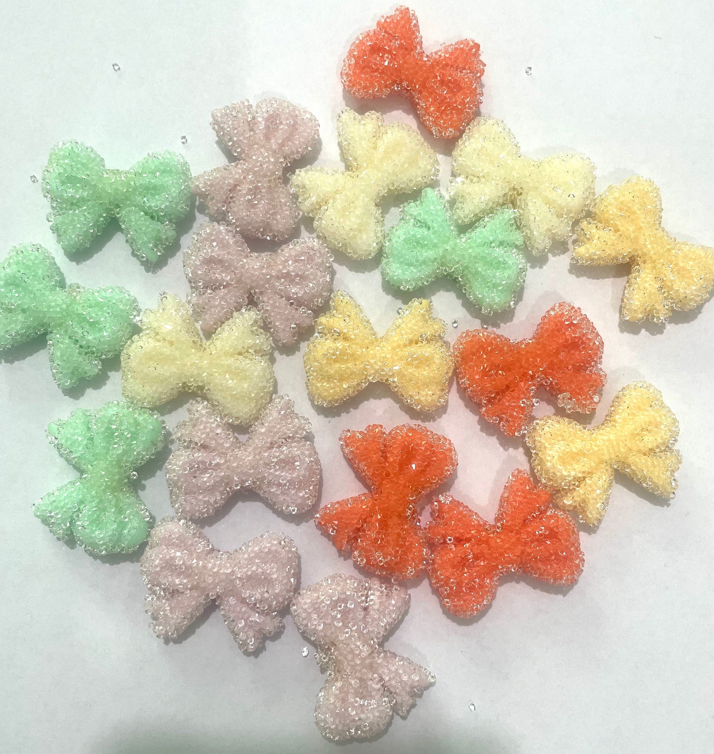 A shiny multicolor bow with a sweet heart Random Mix 32mm
