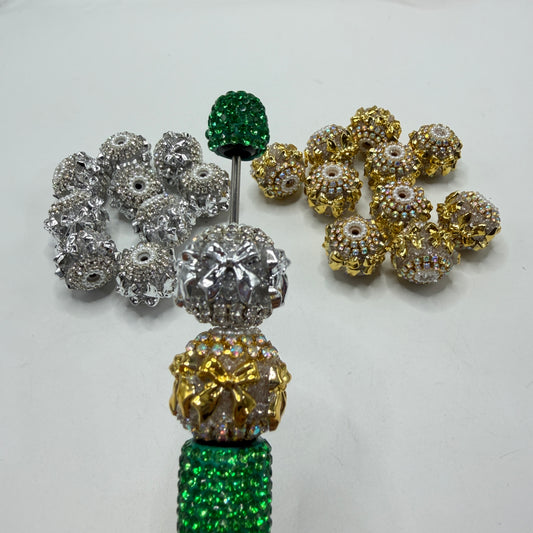 Metallic looking bow fancy beads with rhinestone chain