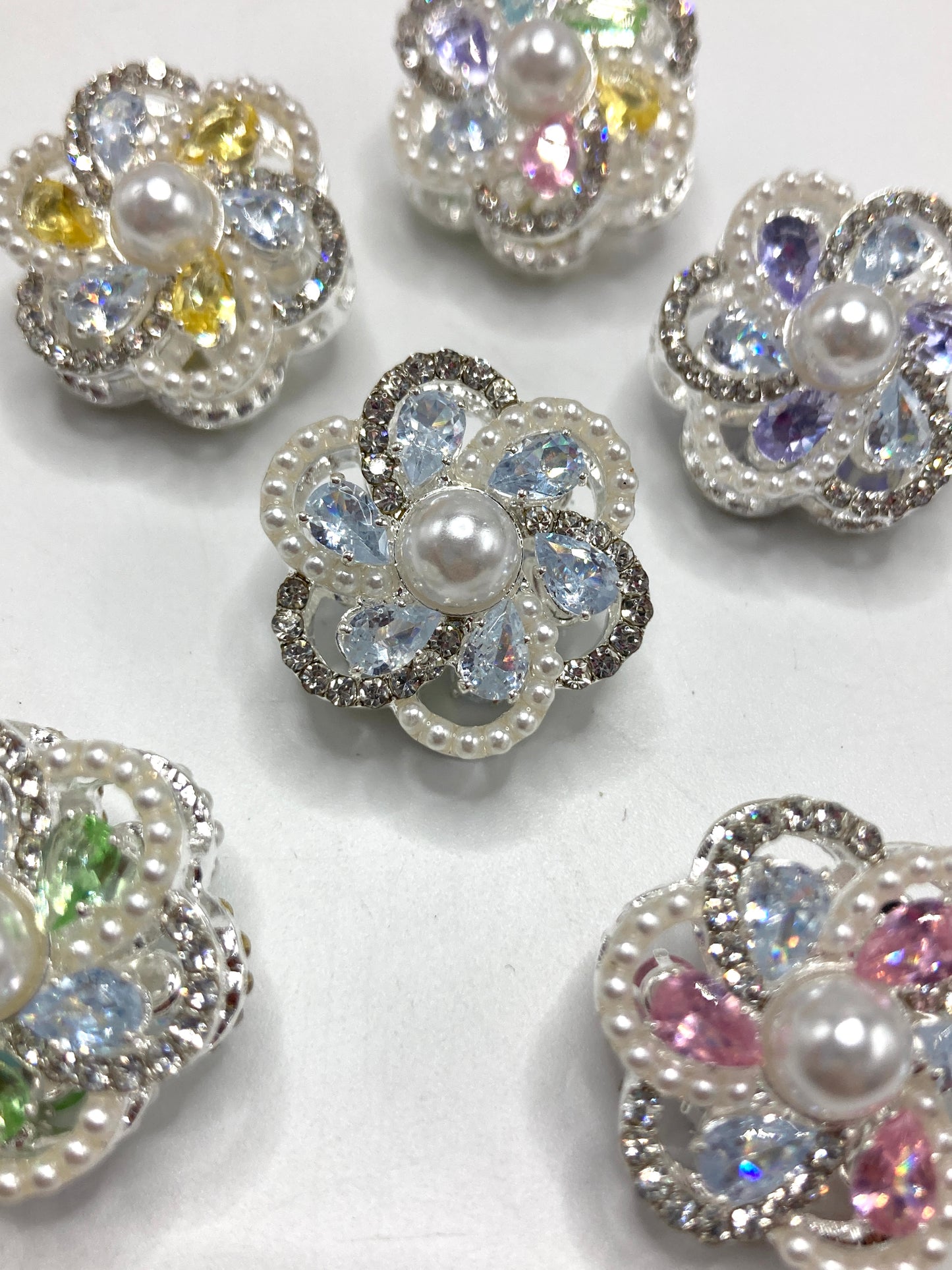 Metal beads Flower beads Metal flowers, pearl stamens Pearl petals and Rhinestone petal Random Mix