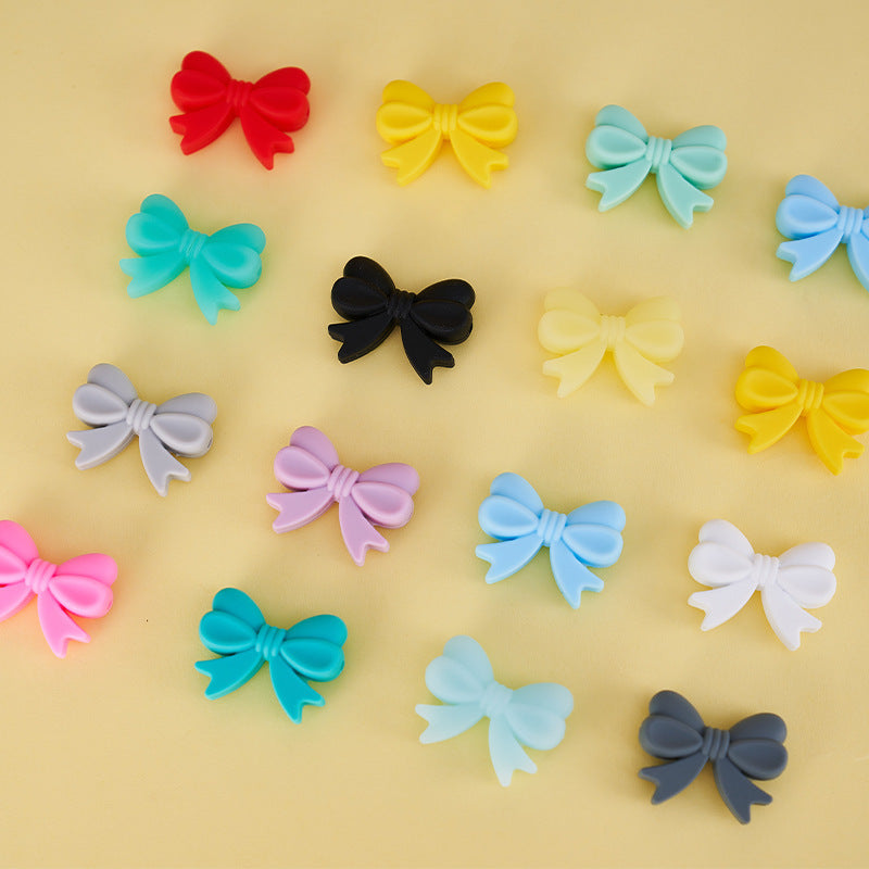 Colored perforated bows Silicone bow Random Mix beaded bow hole from left to right side bow beads for bracelet charms for phone charm