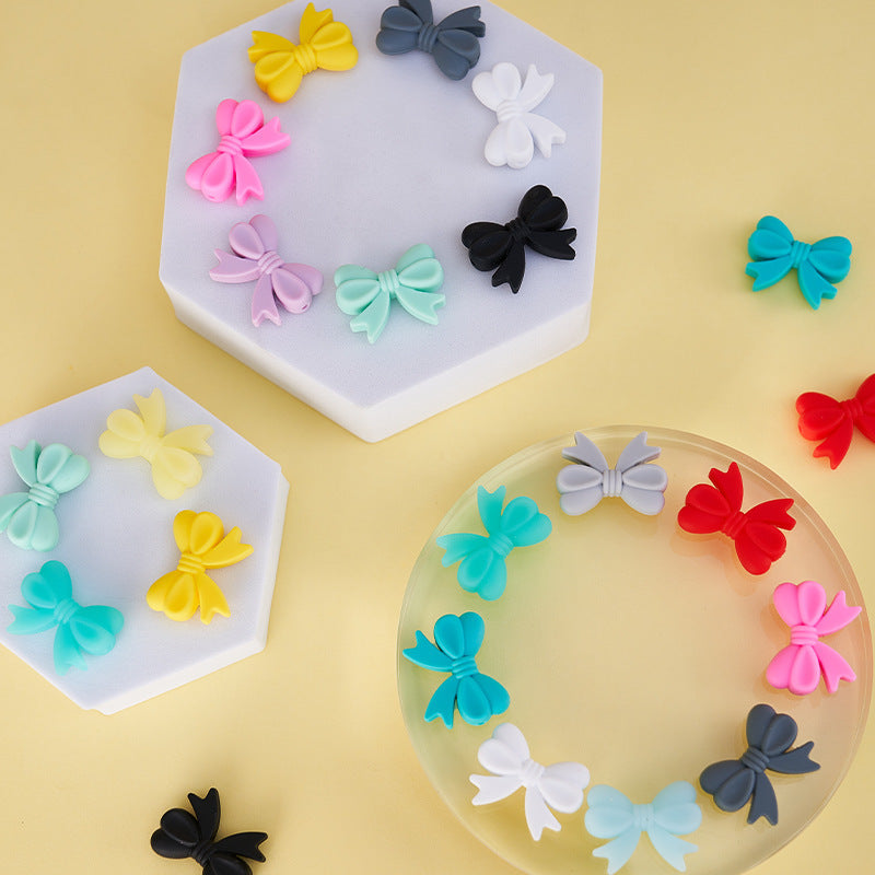 Colored perforated bows Silicone bow Random Mix beaded bow hole from left to right side bow beads for bracelet charms for phone charm