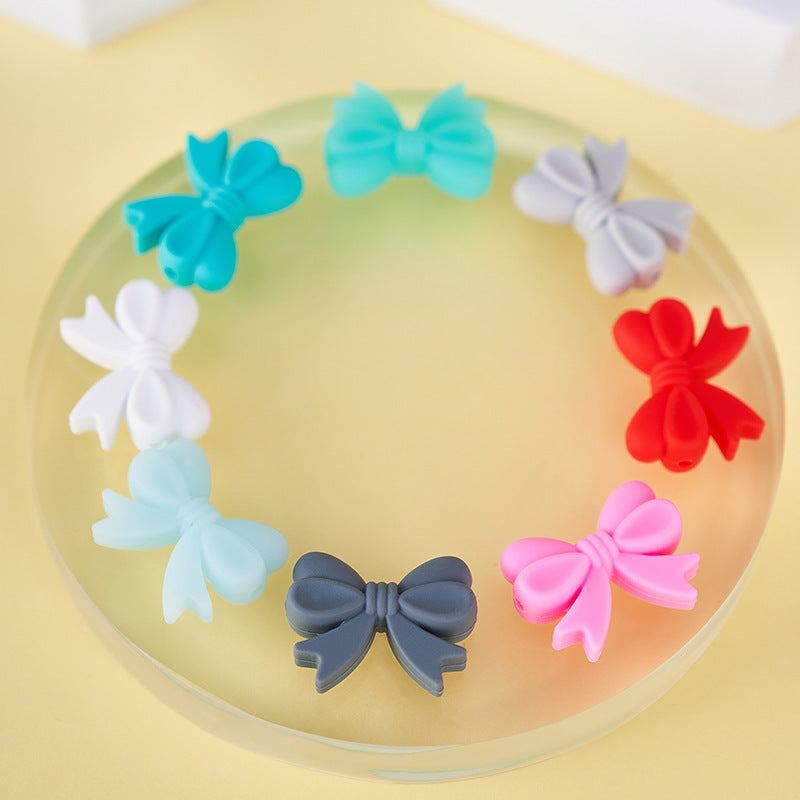 Colored perforated bows Silicone bow Random Mix beaded bow hole from left to right side bow beads for bracelet charms for phone charm
