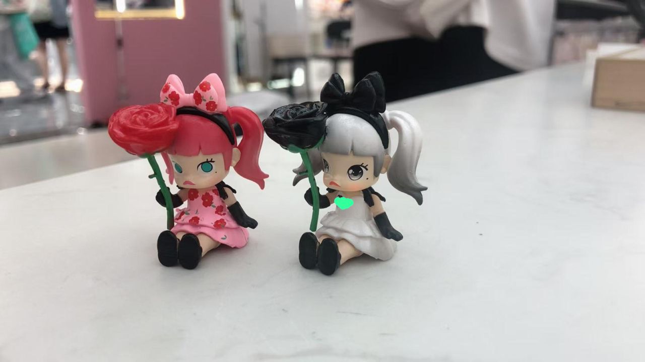 popma figure character molly pind and white pen topper